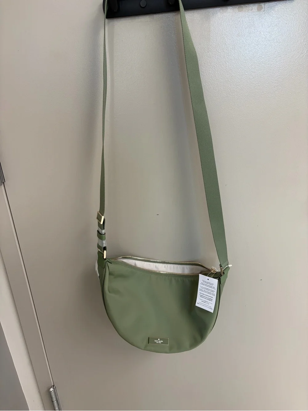 kate spade Carter sling crescent bag